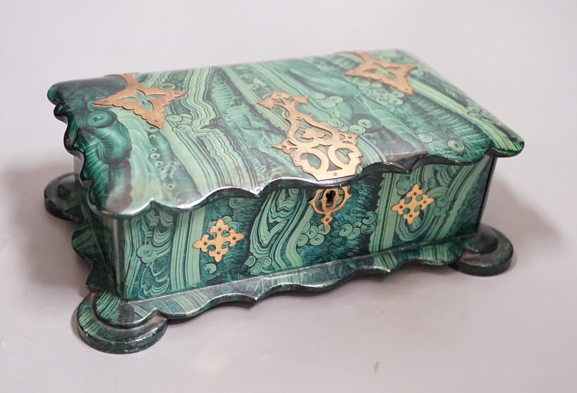 A Victorian papier-mâché-mache faux malachite, brass mounted jewellery box, 21cms wide x 12.5cms deep